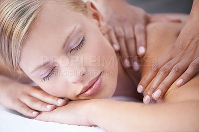 Buy stock photo Young woman, hands and massage for back in spa, health and wellness on bed for physical therapy. Person, reflexology and masseuse for body treatment by touch and muscle comfort with peace at resort