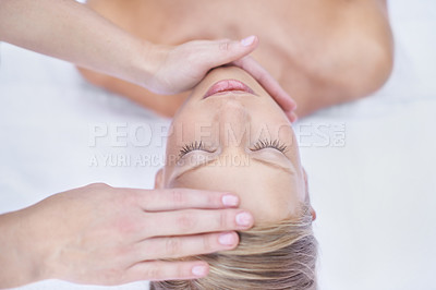 Buy stock photo Relax, acupressure and facial massage, woman in beauty salon for health, wellness and luxury treatment with eyes closed. Spa, professional skin care therapist hands on healthy face of girl from above