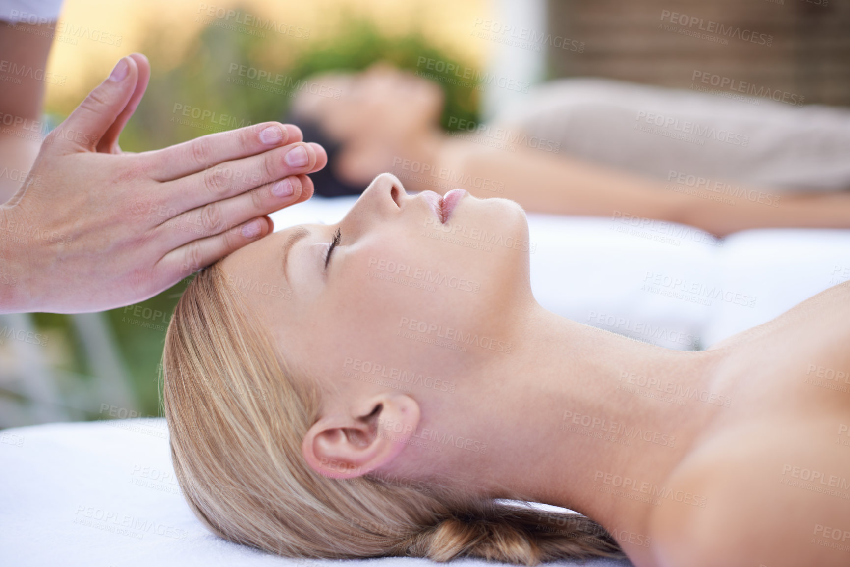 Buy stock photo Reiki, massage and face of woman at beauty salon for health, wellness and luxury skincare treatment. Relax at spa, professional skin care and facial acupressure, healing for girl in cosmetic therapy.