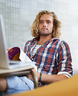 Buy stock photo Student, reading and learning in classroom for education, language development or knowledge in university. Young man listening to lecture with books for college, laptop research or course information