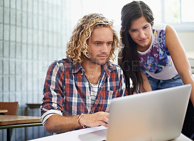 Buy stock photo Laptop, students and friends learning in university, research or reading online together. Computer, education and team in college for studying knowledge, typing information or scholarship in class