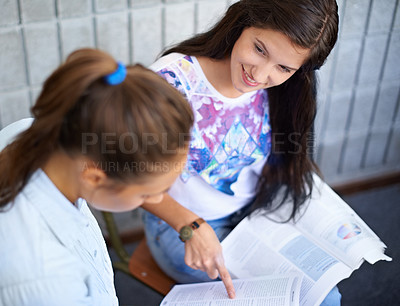 Buy stock photo Women, studying and learning with education, problem solving or solution for knowledge, language or project. Young students, friends or people reading books, helping and collaboration for university