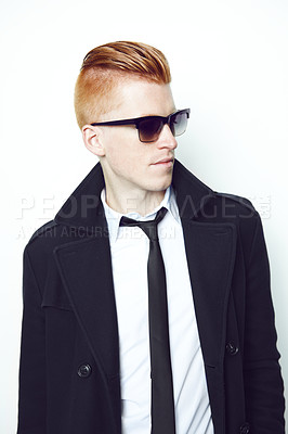 Buy stock photo Fashion, cool and man in a suit in a studio with sunglasses and a stylish formal outfit. Young, cool and handsome male model with elegant trendy style and confidence isolated by a white background.