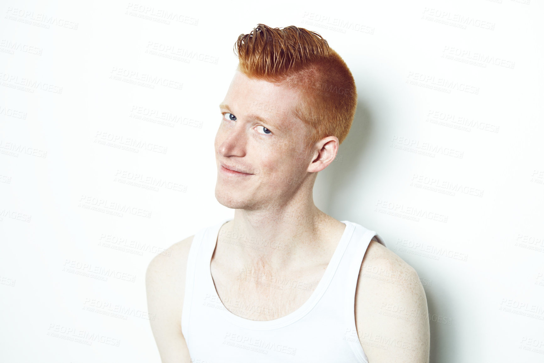 Buy stock photo Happy, ginger and portrait of man in studio for casual, red hair and trendy style. Natural, smile and shy with face of male model isolated on white background for confident, pride or mockup