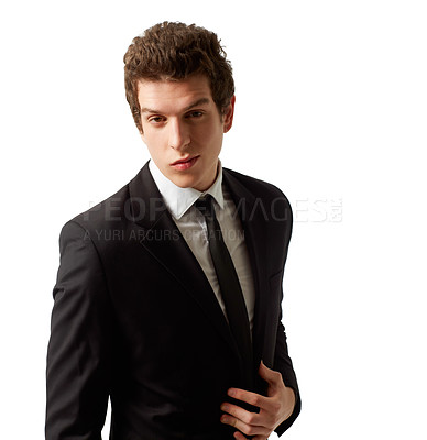 Buy stock photo A suave young man wearing a suit looking at the camera