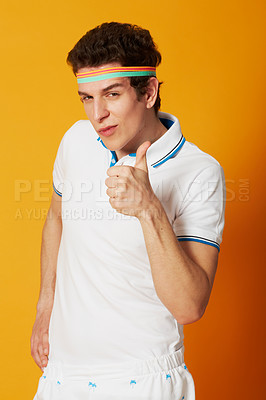 Buy stock photo Man, sports portrait and thumbs up isolated on studio background for winning, success and like, vote or yes sign. Face of retro athlete or tennis person okay, good luck and winner hand or funny emoji