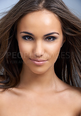 Buy stock photo Happy woman, portrait and hair in natural beauty, skincare or cosmetics on a gray studio background. Face of female person, brunette or model smile in satisfaction for facial treatment or haircare