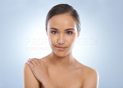 Buy stock photo Woman, portrait and skincare in natural beauty, makeup or cosmetics on a blue studio background. Face of young female person or model smile for smooth skin, glow or facial treatment on mockup space