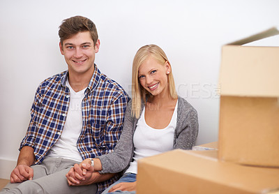 Buy stock photo Couple, moving and new home, portrait with boxes for packing and real estate, happy holding hands and support. Property, investment and people smile with cardboard for relocation, mortgage or rent