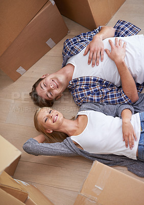 Buy stock photo Couple, floor and moving or boxes for relax from packing or  real estate property or bonding, marriage or apartment. Man, woman and rest for investment loan or mortgage for relocation, rent or buy