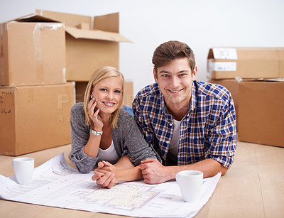Buy stock photo Man, woman and portrait with floor plan of new home for renovation or moving boxes, apartment or relocation. Couple, face and ground with coffee or blueprints for house, development or improvement