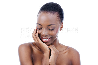 Buy stock photo Skincare, beauty and face of shy black woman on a white background for wellness, cosmetics and makeup. Dermatology, salon aesthetic and person smile for natural, glow and facial treatment in studio