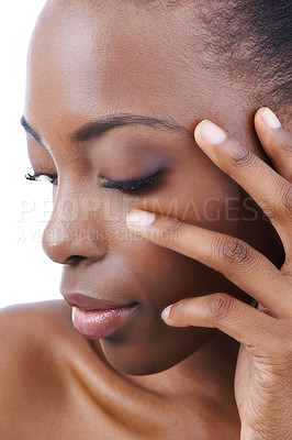 Buy stock photo Face, aesthetic and skincare of natural black woman in studio isolated on white background for spa treatment. Beauty, wellness or relax and confident model touching skin with hands for dermatology