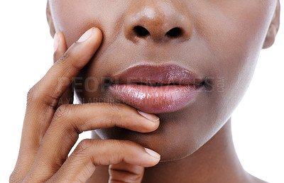 Buy stock photo Skincare, beauty and lips of black woman on a white background for wellness, cosmetics and makeup. Dermatology, salon and face closeup of person with gloss, lipstick and natural skin in studio