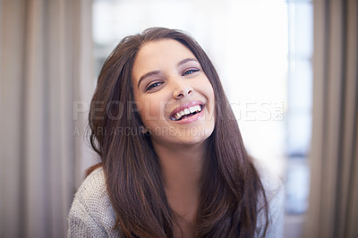 Buy stock photo Woman, laugh and relax in home portrait with happiness on holiday or vacation with comfort in hotel. Travel, accommodation and girl with a smile in lounge at lodge with joke, humor or funny memory