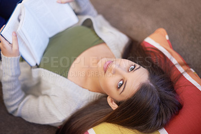 Buy stock photo Portrait of woman, top view or reading book for knowledge at home, literature and fiction novel to relax. Indian person, student and information for learning, comfortable and fantasy story on weekend