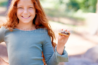 Buy stock photo Happy, child and portrait of eating smores outdoor, camping and relax at barbecue with dessert or cookie. Girl, smile and hungry for biscuit with marshmallow in woods or forest on holiday or vacation