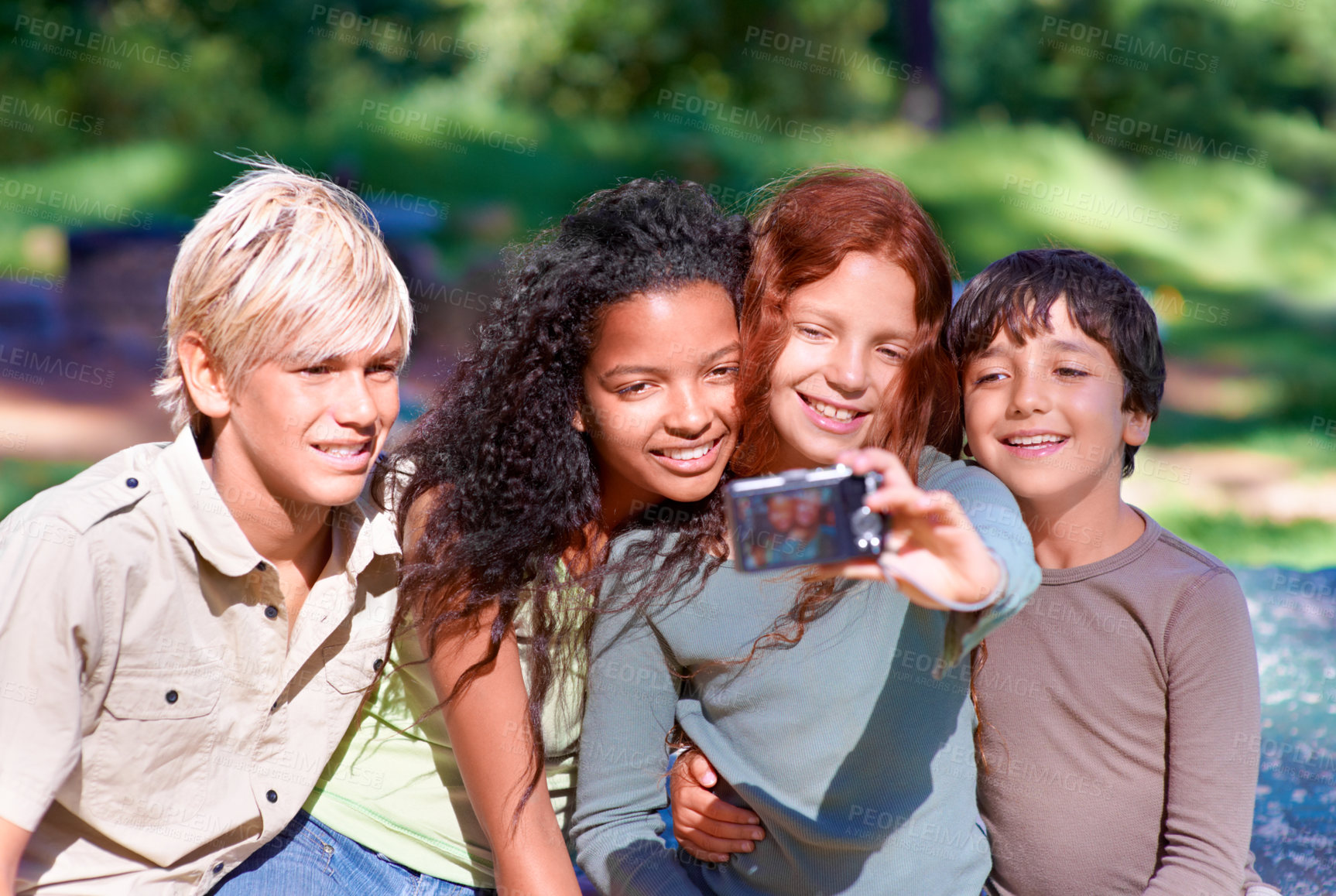 Buy stock photo Children, friends and embrace outdoors in selfie for social media, camera and memories. Photograph, technology and profile picture on holiday or vacation in nature, smile and hug in post update
