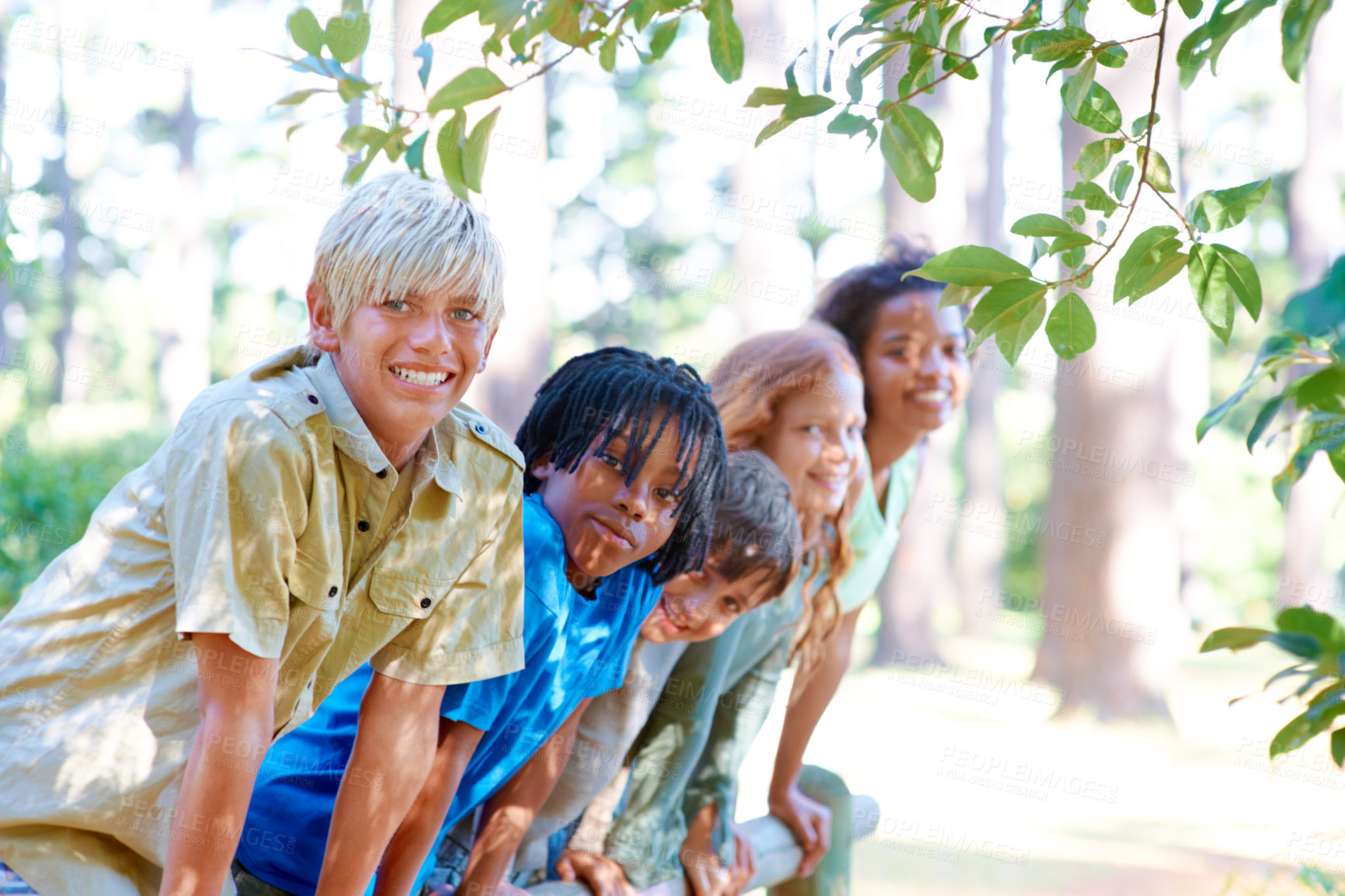 Buy stock photo Children, friends and relaxing in portrait on summer holiday, support and bonding in nature. Diversity, kids and smile for love on outdoor adventure, fun and peaceful in forest or woods on vacation