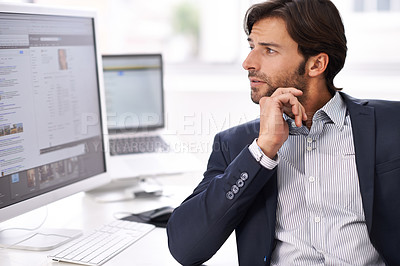 Buy stock photo Computer, thinking and research with business man at desk in office for planning, reading or editing. Website, homepage or problem solving with confident young employee in suit at corporate workplace