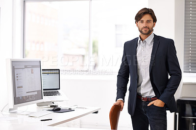 Buy stock photo Portrait, office and businessman at tech startup with computer, website and small business online. Professional, ux design and entrepreneur at desk with confidence, internet research and creativity.