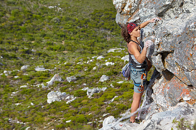 Buy stock photo Rock climbing, freedom and challenge with woman on mountain for adventure, travel and explore. Strong, fitness and cliff with female climber training in nature for courage, safety and workout