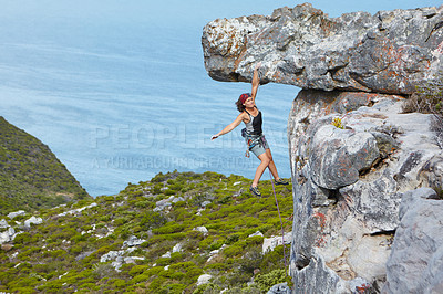 Buy stock photo Fitness, mountain and woman rock climbing, exercise and nature with wellness, balance and hobby. Female person, girl or mountaineer with tools, environment or workout with a view or healthy lifestyle