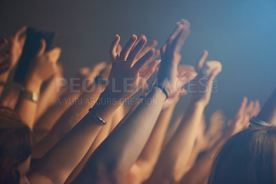 Buy stock photo Hands, crowd and celebration or friends at music festival, collaboration and freedom at nightclub. People, closeup and weekend at party or social event, concert and community or together at show