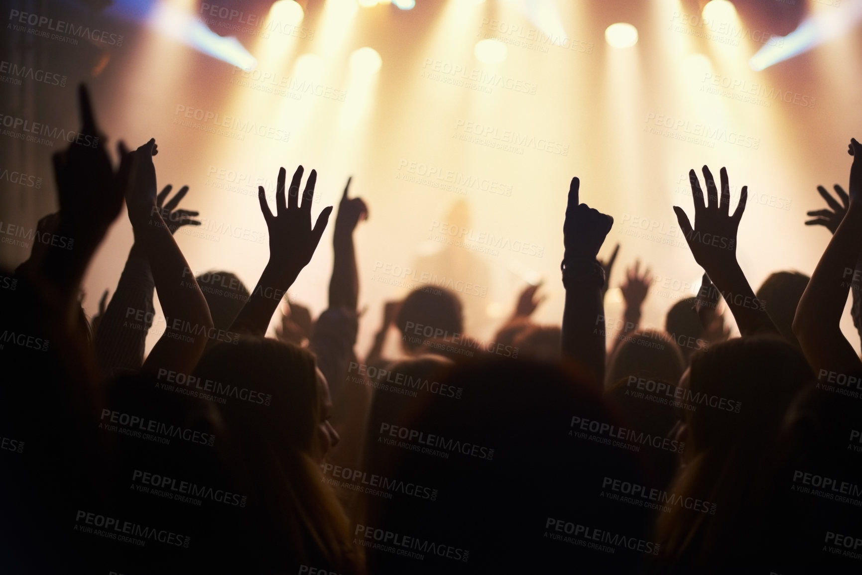 Buy stock photo Hands, crowd and solidarity or music festival at night, collaboration and energy at nightclub. People, closeup and celebration at party or social event, concert and community for band performance