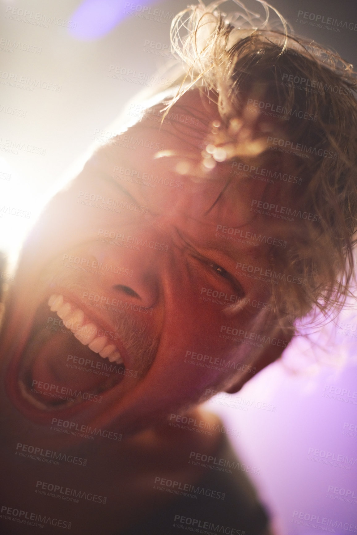 Buy stock photo Portrait, closeup and man screaming for rockstar performance at concert for entertainment at night. Culture, yelling and face of musician male person with energy at festival for artistic expression