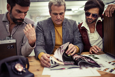 Buy stock photo Businessman, group and magazine design planning in a retro creative agency with strategy. Idea, brainstorming and vintage male people with media publishing and graphic samples for journalism