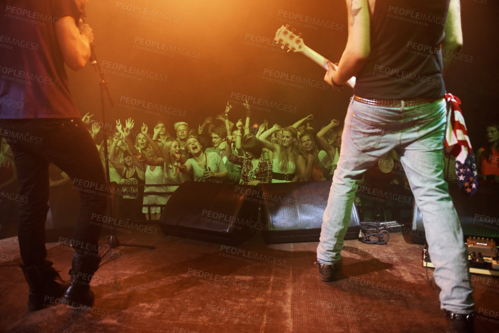 Buy stock photo Music, concert and band on a stage with fans for performance with lighting equipment at party. Event, entertainment and group of musicians at festival, disco or rave with energy for crowd or audience