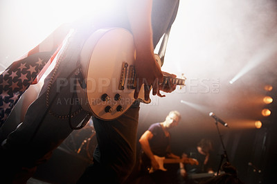 Buy stock photo Guitarist performing on stage at a music festival