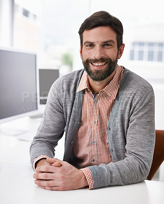 Buy stock photo Portrait, smile and young designer man at desk in office for creative business or artistic career. Face, happy and casual with design employee in company or agency workplace for productivity
