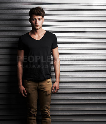 Buy stock photo Fashion, style and portrait with man on wall background for student, trendy and casual. Cool, mockup and handsome with young male person in urban outdoors for edgy, serious and stylish clothes