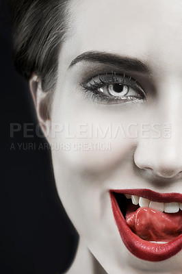 Buy stock photo Woman, portrait and gothic lips in studio for beauty, cosmetics and dark aesthetic with smirk and edgy. Face of model in villain character, fantasy contact lens and red lipstick on a black background