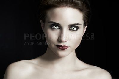 Buy stock photo A fiery gothic girl posing on a black background