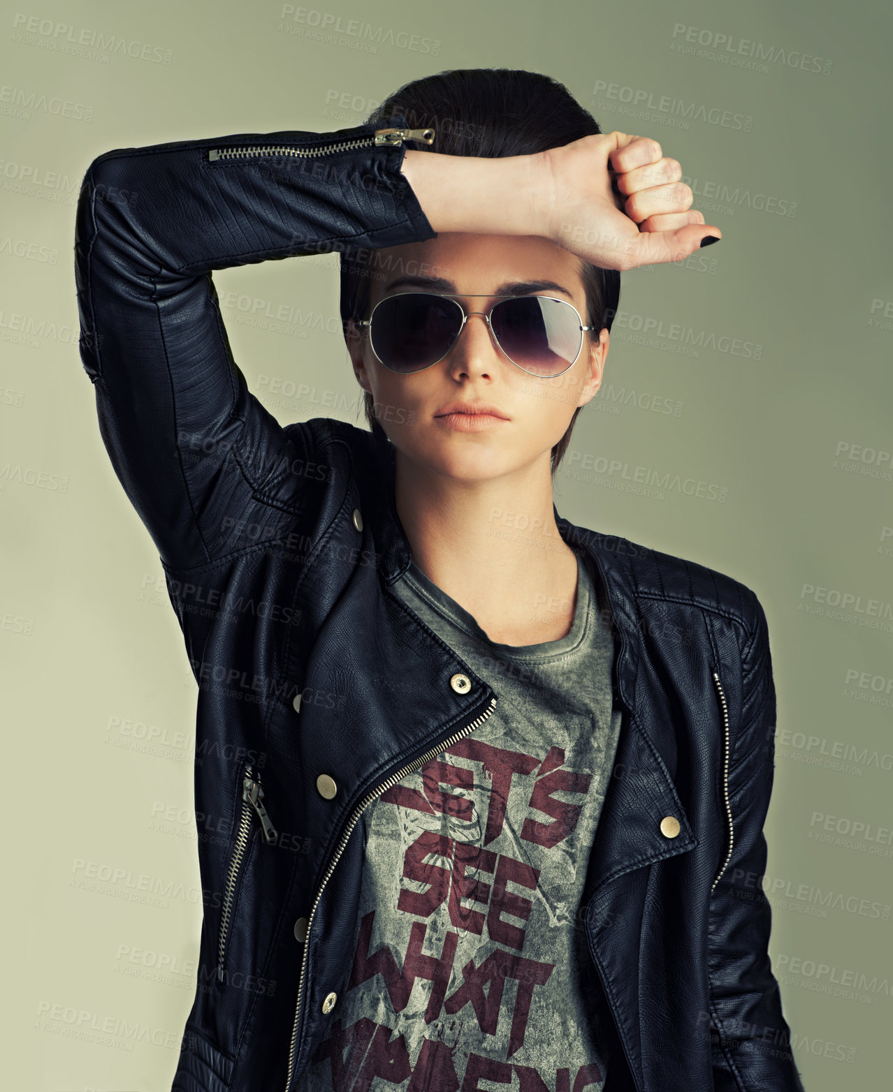 Buy stock photo Woman, studio and punk with confidence, pose and sunglasses for gen z, trendy and fashion. Female rocker, leather jacket and contemporary for expression, tough and edgy portrait with individuality