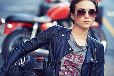 Buy stock photo Motorcycle, sunglasses and woman biker in city with leather jacket for travel, transport or road trip. Fashion, rebel and female person with grunge, gothic or edgy punk style for bike in town.