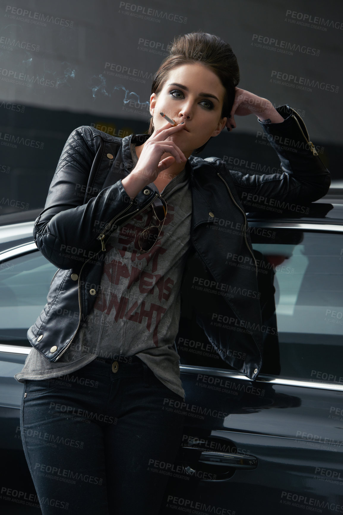 Buy stock photo Woman, waiting and smoking cigarette on car in parking lot for pick up or transportation. Female person, smoker or driver in fashion with leather jacket and inhaling tobacco by stationary vehicle