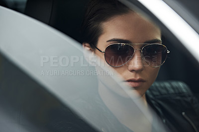 Buy stock photo Window, car and face of woman with sunglasses for cool style and accessory while driving on a trip. Edgy, trendy and eyewear with a fashionable female person in a transport vehicle for journey 