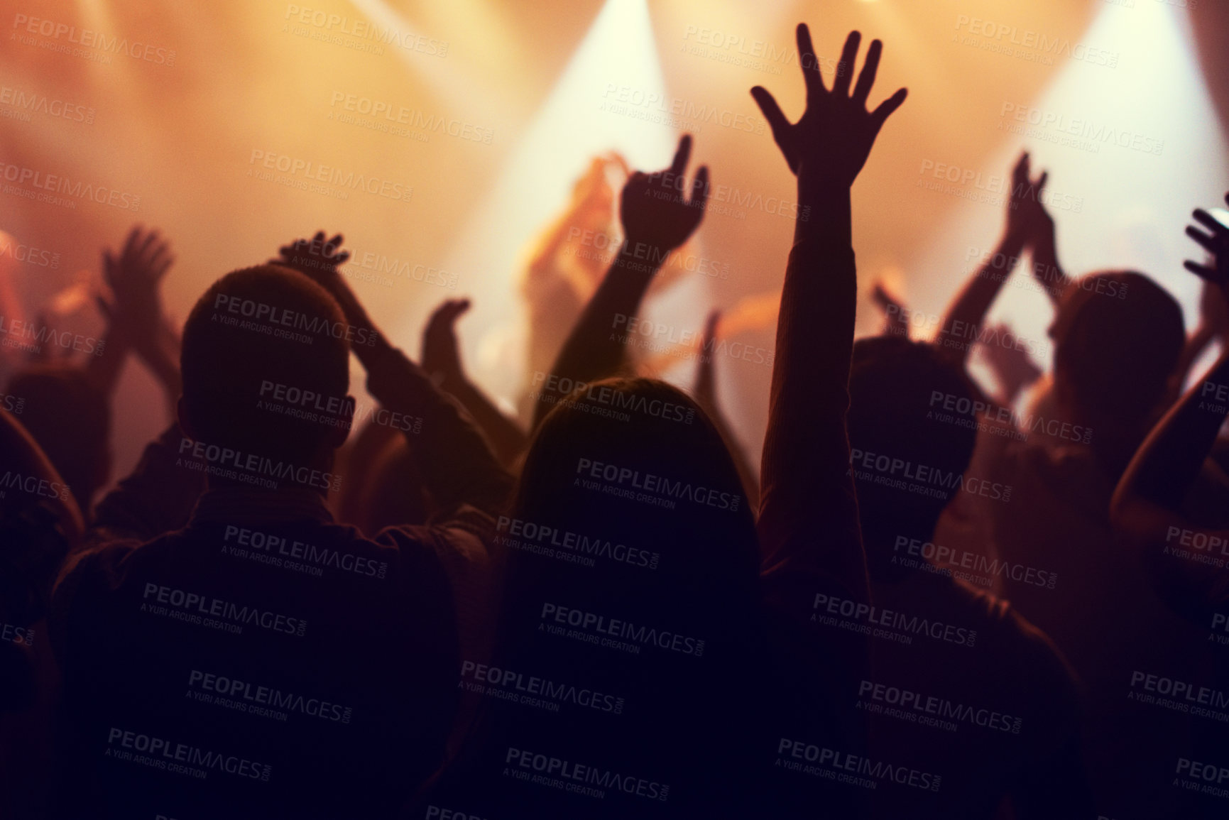 Buy stock photo Music, lights and hands of crowd at concert for party, disco and live band performance. Dance, nightclub and silhouette of audience listening to artist on stage at festival for energy, rave and event