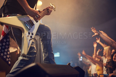 Buy stock photo Concert musician, guitar and rock on stage for crowd, party or festival gig in night with american flag. Professional artist, band and music festival for event for talent, music solo and performance