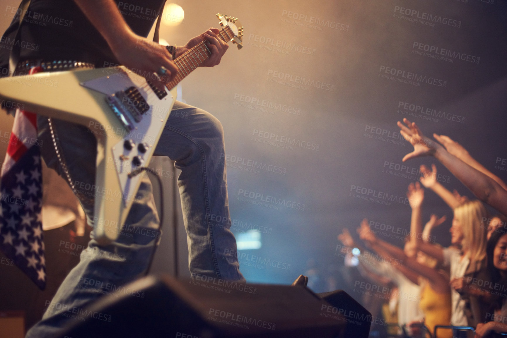 Buy stock photo Concert musician, guitar and rock on stage for crowd, party or festival gig in night with american flag. Professional artist, band and music festival for event for talent, music solo and performance