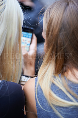 Buy stock photo Social media, phone and friends typing a message, texting and writing in online conversation on app. Technology, communication and teenagers using smartphone for chatting, mobile app and networking