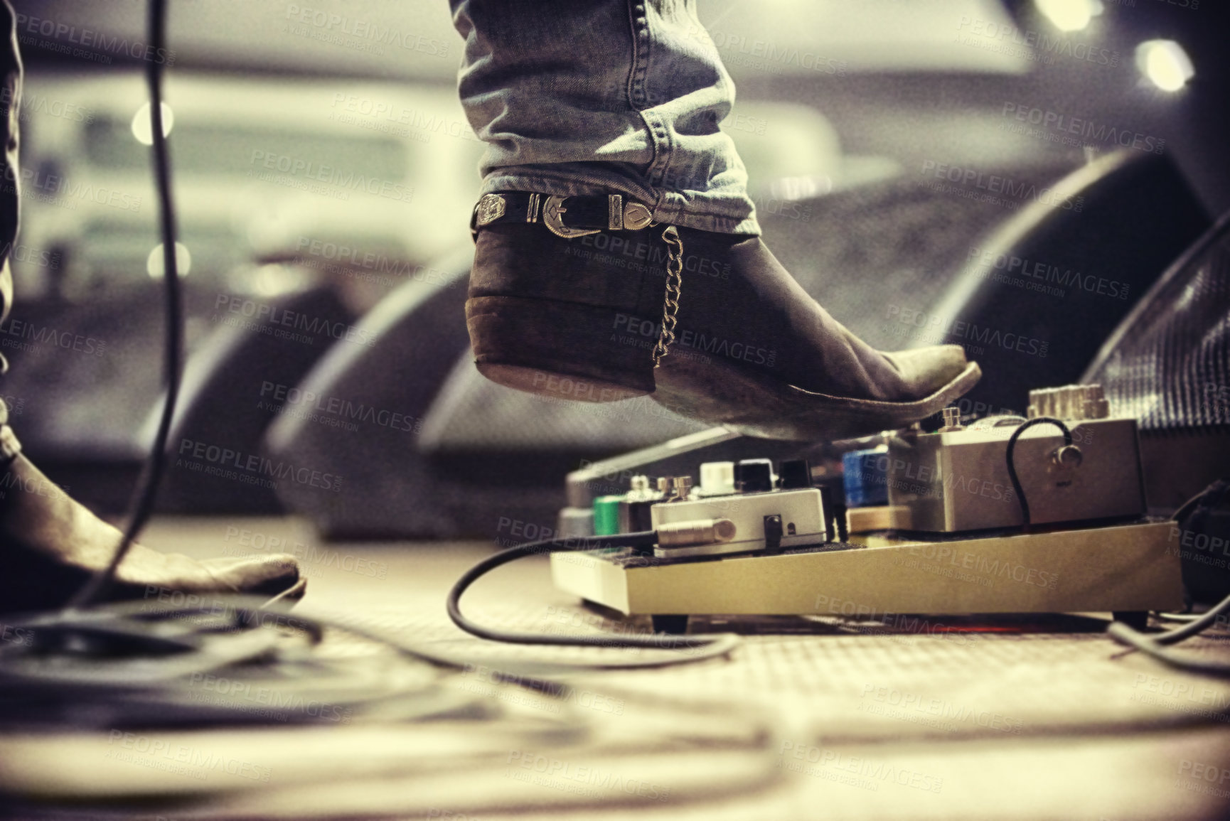 Buy stock photo Cropped shot of a music artist's foot on a foot pedal