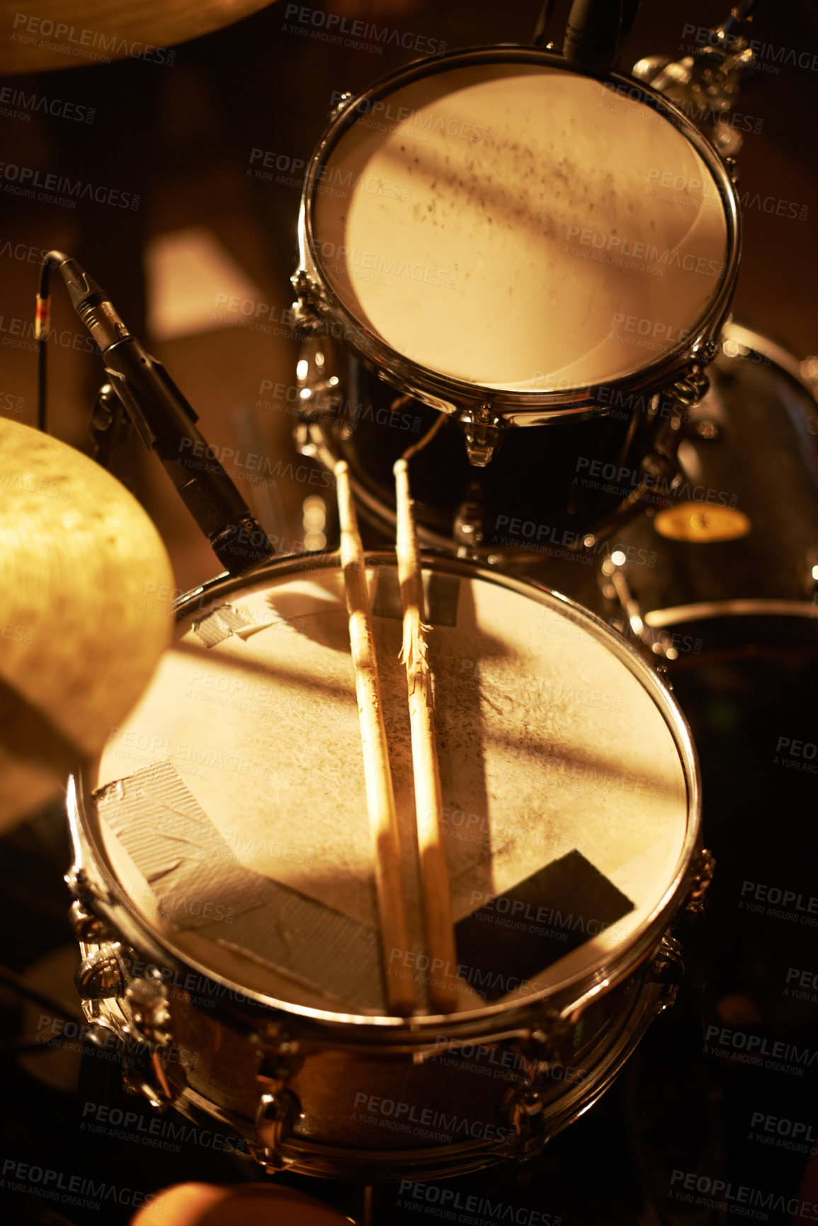 Buy stock photo Drum, microphone and music in closeup for studio, record and rehearsal for stage, performance and studio with passion. Instrument, equipment and musician with entertainment for live at concert