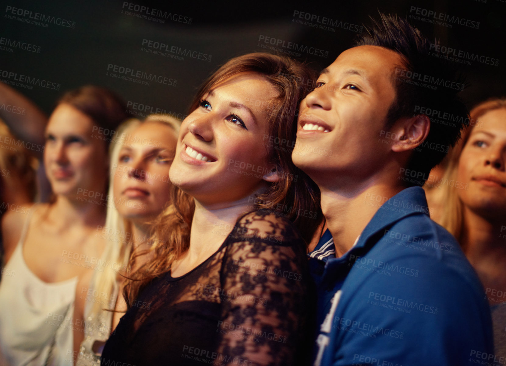 Buy stock photo Music, night and crowd with couple at concert for band, happiness and festival date together. Fans, support and social with group of people at musician event for audience, performance and song