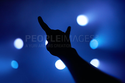 Buy stock photo Horns, silhouette and music with hand at concert for performance, nightclub and musician. Celebration, party and audience with closeup of person and rock gesture for support, crowd and festival