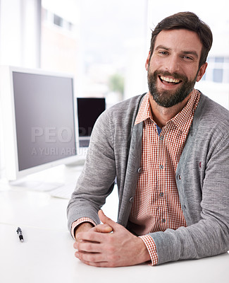Buy stock photo Laughing, happy and portrait of man in office with positive, good and confident attitude. Smile, technology and professional male web designer sitting at desk with computer in modern workplace.